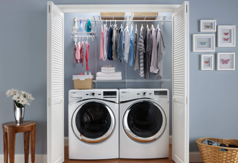 Wire shelving hung above the washer and dryer gives you multiple storage options.