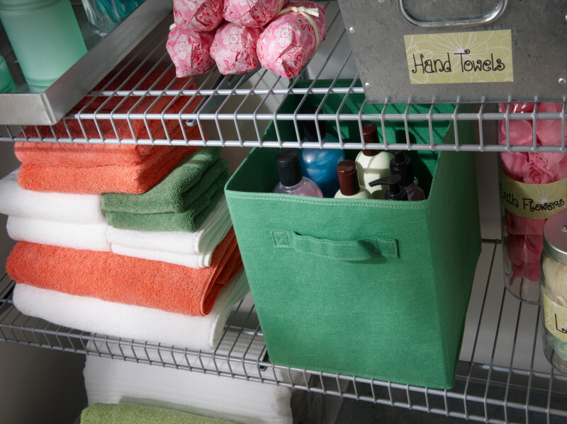 fabric drawer in bathroom linen closet