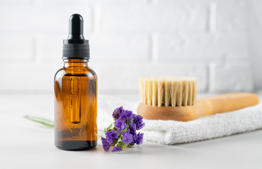 lavender bottle and loofah brush