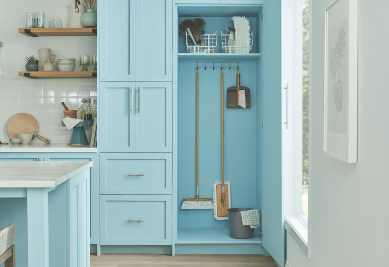 cabinet with hooks for mop and dustbin